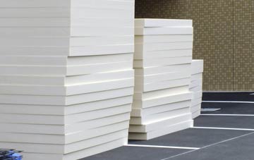 Coombe Bissett flat roof insulation costs